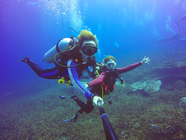 underwater scuba diving selfie shot with selfie stick
